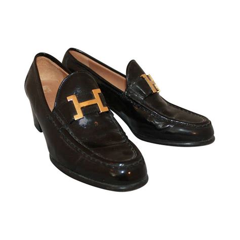 black hermes loafers